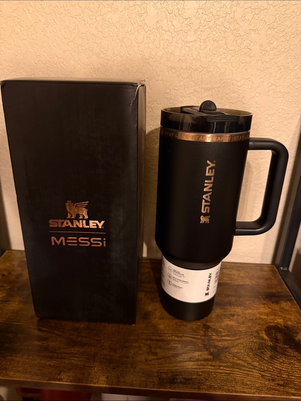 Stanley 40oz Messi Black Travel Mug with Gold Logo and Handle